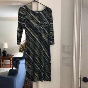 Dress with 3/4 length sleeves, it has some stretch to it